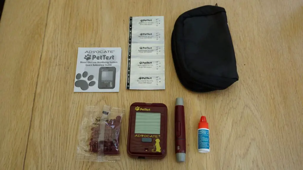 Image of an animal blood glucose test kit placed out on a table